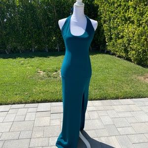 Gorgeous teal Nookie gown with slit at leg. Size medium